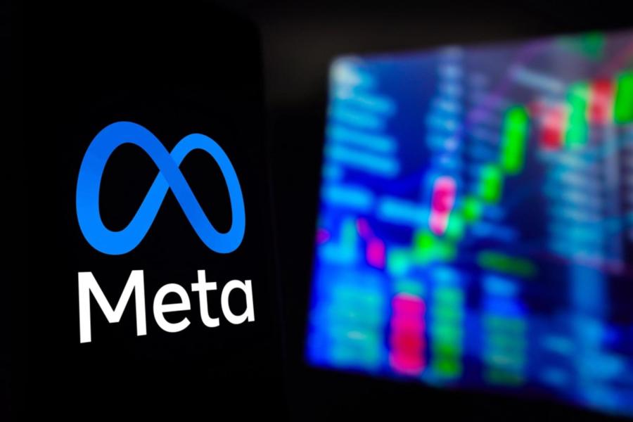 Meta Platforms logo on smartphone stock chart background