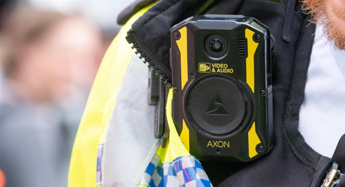 London, UK. 19th July 2023. Body camera being worn by police officers in London, to keep officers safe, enabling situation awareness, improving community relations and providing evidence for trials. — Stock Editorial Photography