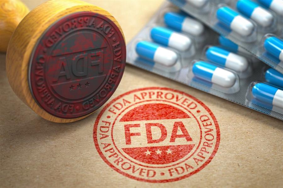 FDA approved concept. Rubber stamp with FDA and pills on craft
