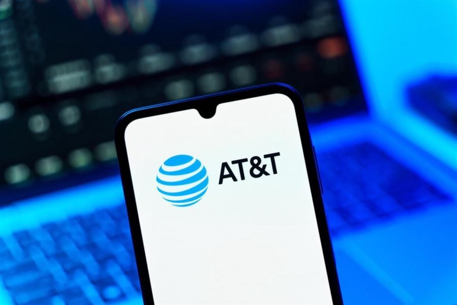 Prague, Czechia - 10 21 2024: Smartphone on surface showing AT and T logo. — Stock Editorial Photography