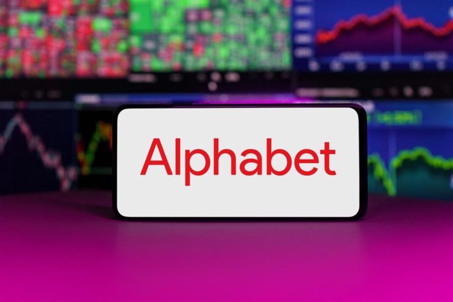 Alphabet logo on mobile phone screen company shares rise or fall on stock exchange market. London, United Kingdom - 2024 November 6
